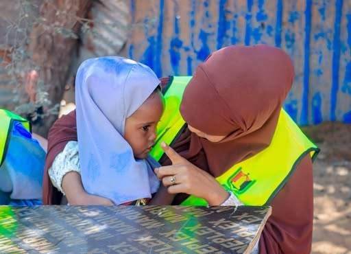 Photo from: Community distribution with volunteers